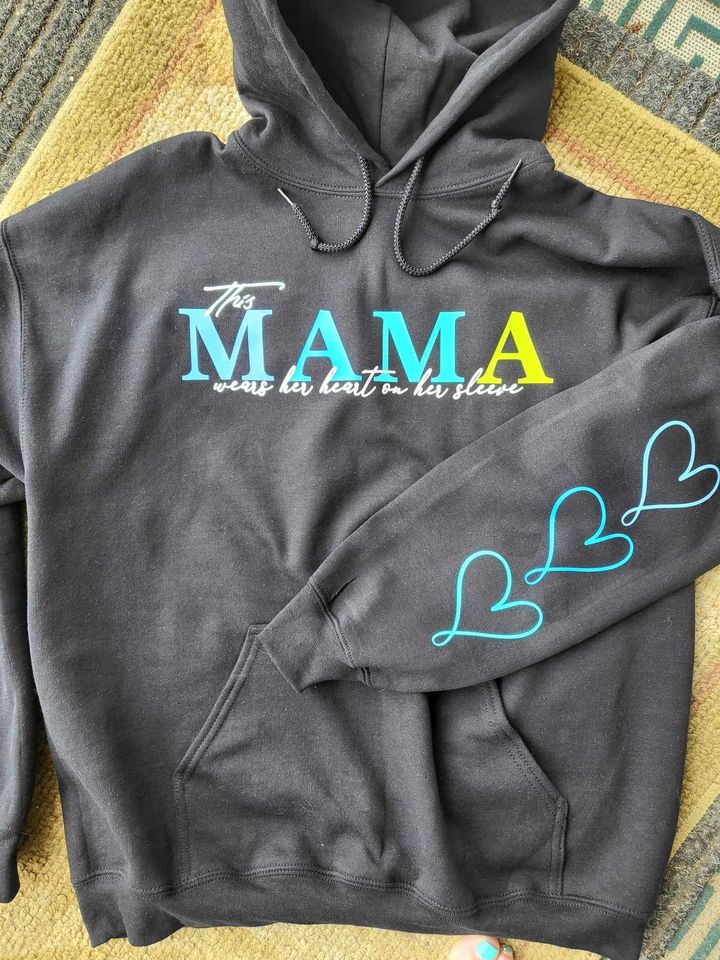 Customizable "This mama wears her heart on her sleeve" hoodie image 0
