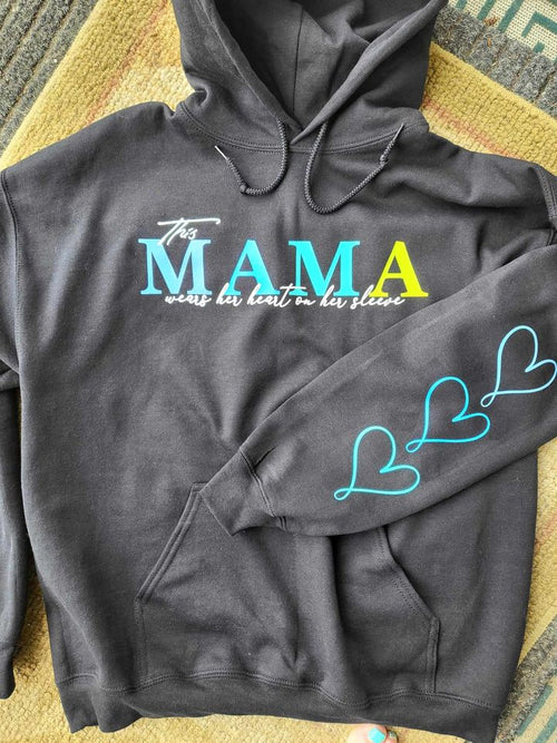 Customizable "This mama wears her heart on her sleeve" hoodie image 0